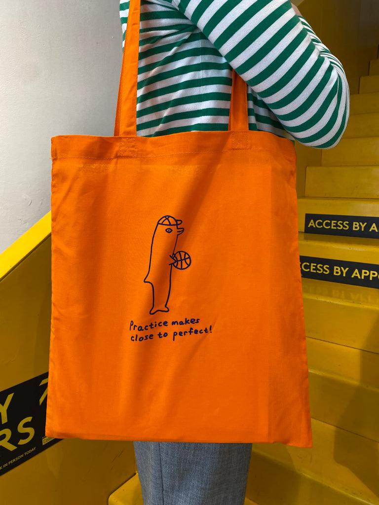 'Practice Makes Close To Perfect' Tote Bag