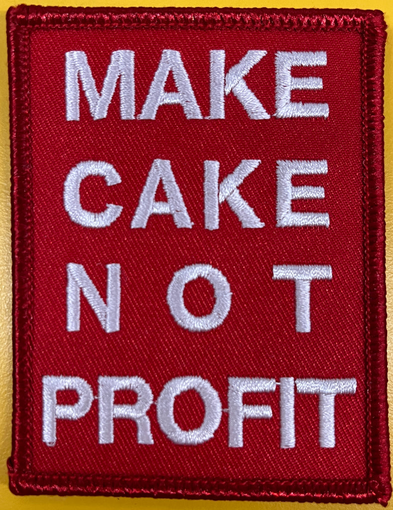 MAKE CAKE NOT PROFIT Iron-On Patch